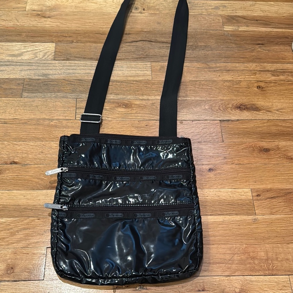 Black LeSportsac Crossbody Bag adjustable strap in good condition